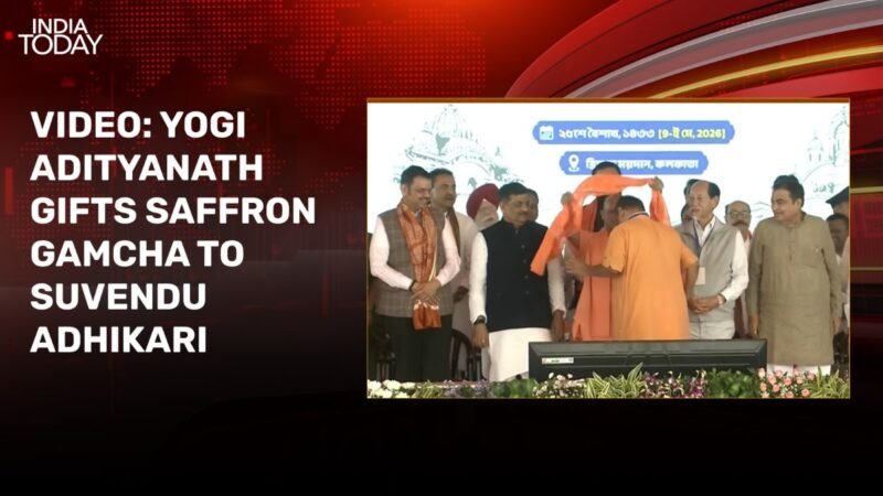 Video: Yogi Adityanath gifts saffron gamcha to Suvendu Adhikari at his oath-taking