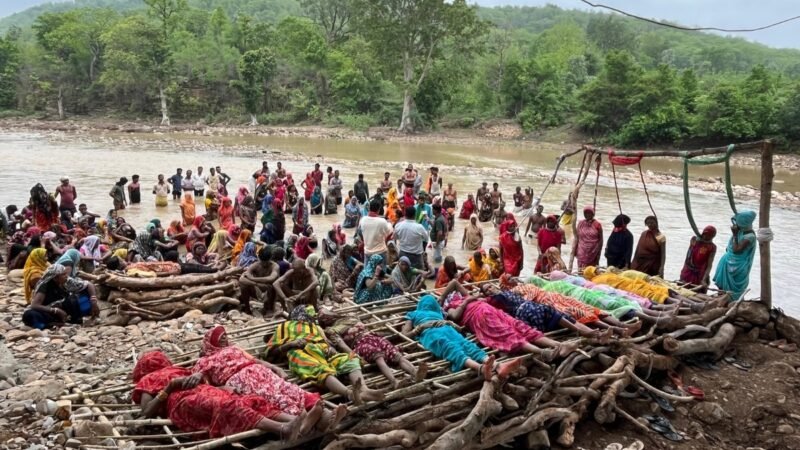 Why are tribals in Madhya Pradesh sitting on pyres with nooses around their necks?